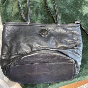 Pretty black Coach purse.  Little worn.